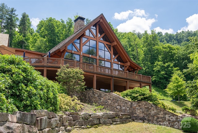 rear view of house with a deck