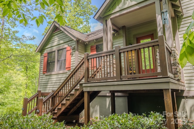 142 Allspice Ct, Tuckasegee, NC 28783 - rear view of property with stairs and a deck
