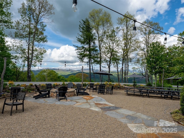 142 Allspice Ct, Tuckasegee, NC 28783 - view of patio featuring a mountain view