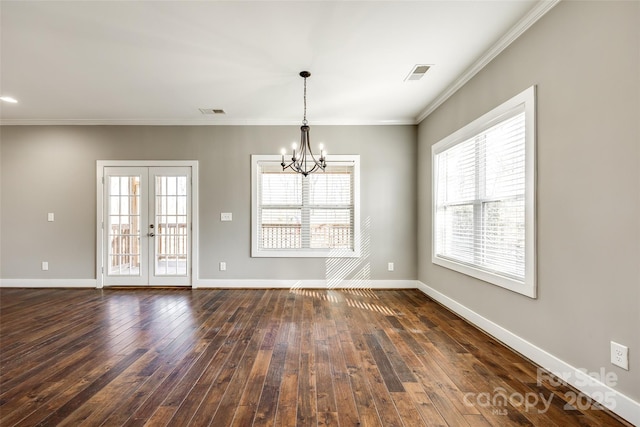 unfurnished dining area with a notable chandelier, visible vents, baseboards, french doors, and dark wood-style floors