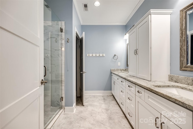 bathroom featuring double vanity, a marble finish shower, visible vents, crown molding, and a sink