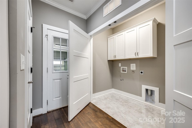 laundry room featuring cabinet space, dark wood finished floors, ornamental molding, hookup for a washing machine, and electric dryer hookup