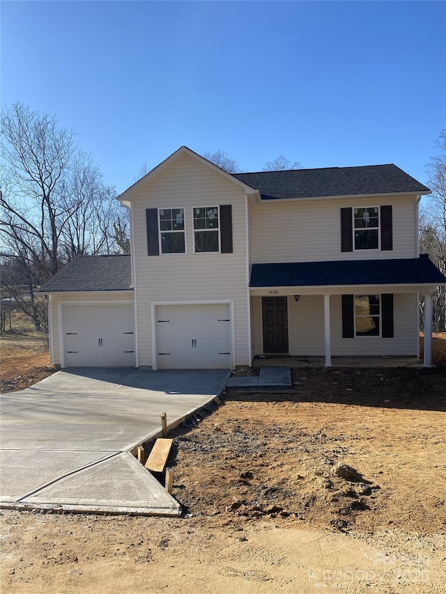 view of front property with a garage