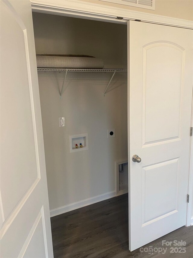 washroom featuring hookup for an electric dryer, washer hookup, and dark hardwood / wood-style flooring