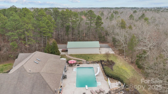 bird's eye view featuring a view of trees