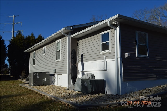 view of property exterior featuring cooling unit