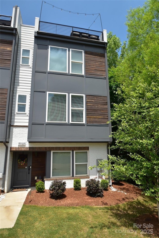 7020 Loso Commons Way, Charlotte, NC 28217 - view of front of house featuring brick siding