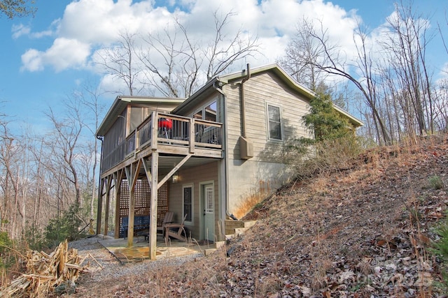 363 Luther Burbank Dr, Lake Lure, NC 28746 - back of property featuring a wooden deck and a patio