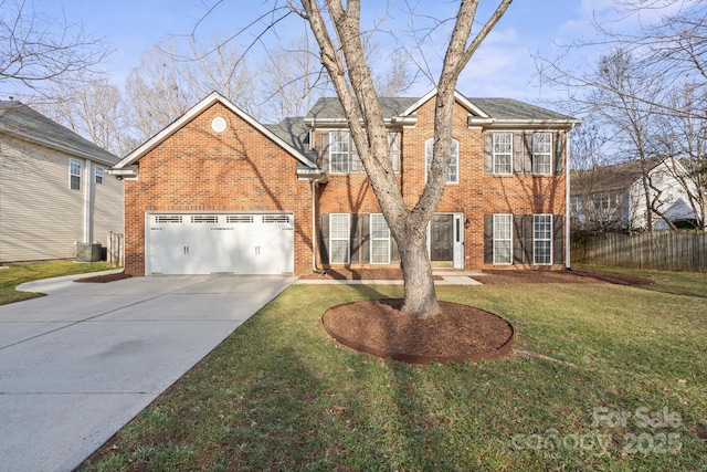 view of front facade featuring a garage and a front yard