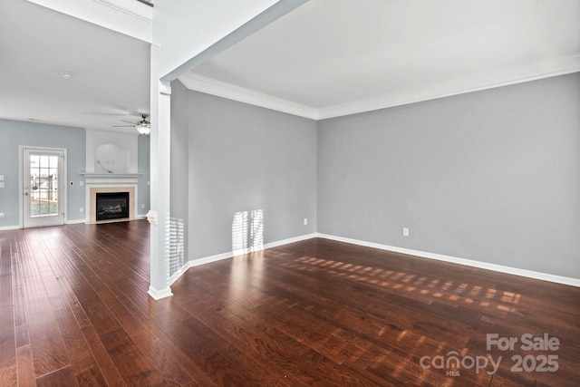 unfurnished living room featuring crown molding, hardwood / wood-style floors, and ceiling fan