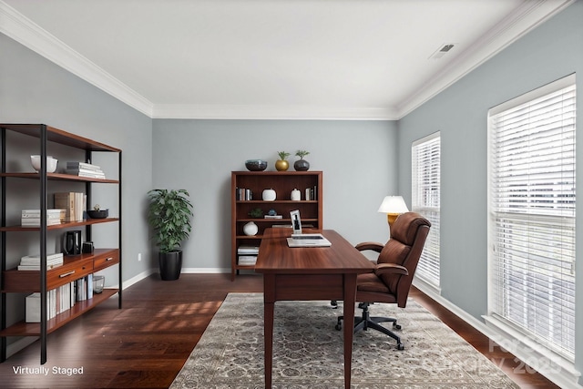 office area with dark wood-type flooring and ornamental molding