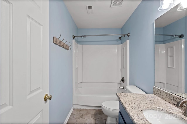 full bathroom featuring vanity, tile patterned floors, toilet, and bathtub / shower combination