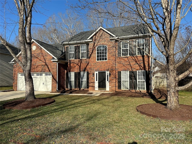 colonial inspired home featuring a garage and a front yard