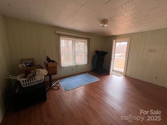 interior space featuring hardwood / wood-style flooring and a wealth of natural light