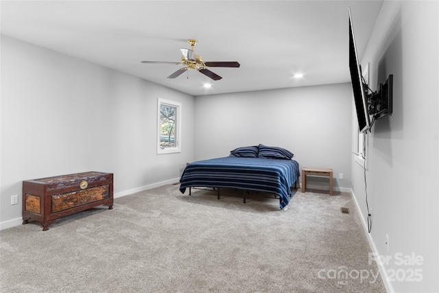 carpeted bedroom featuring ceiling fan