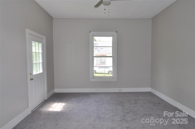 529 Gage St, Chester, SC 29706 - carpeted empty room featuring plenty of natural light, ceiling fan, and baseboards