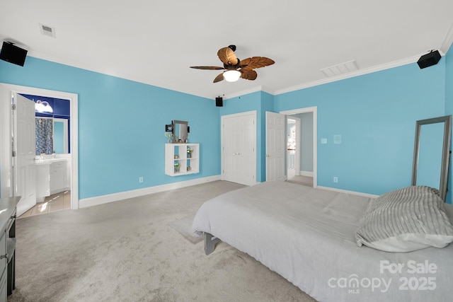 bedroom with light carpet, ornamental molding, a closet, and ceiling fan