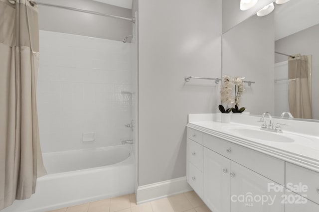 bathroom featuring tile patterned floors, shower / bathtub combination with curtain, and vanity