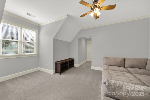 living room featuring crown molding, vaulted ceiling, light colored carpet, and ceiling fan