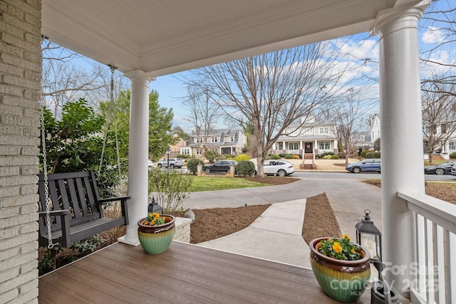 wooden deck featuring a porch