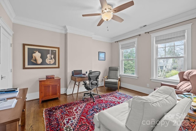 living room with dark wood-type flooring, ornamental molding, and ceiling fan