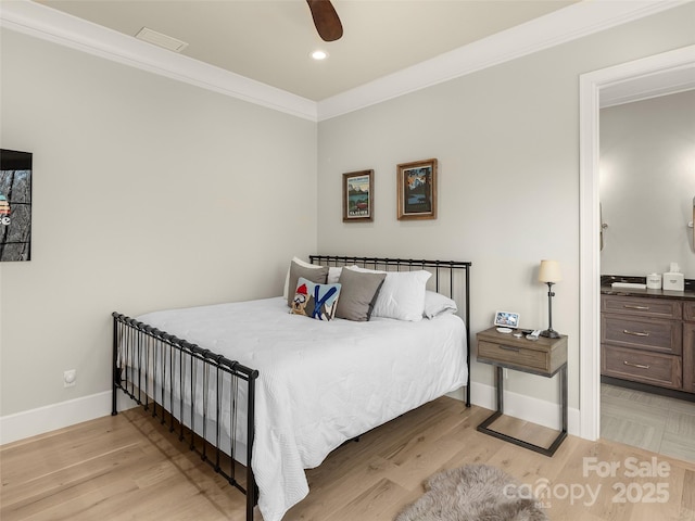 bedroom featuring ornamental molding, ceiling fan, and light hardwood / wood-style flooring