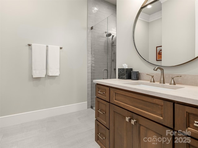 bathroom featuring walk in shower and vanity