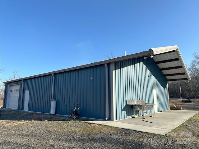 view of outdoor structure with a garage