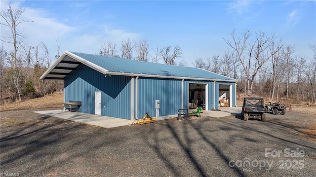 view of outbuilding featuring a garage