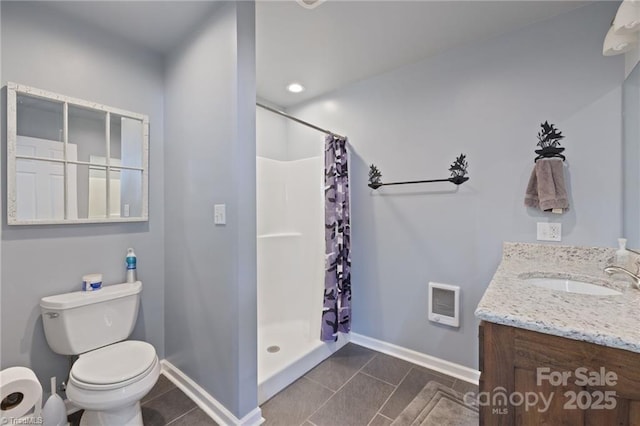 bathroom with a shower with curtain, tile patterned floors, toilet, and vanity