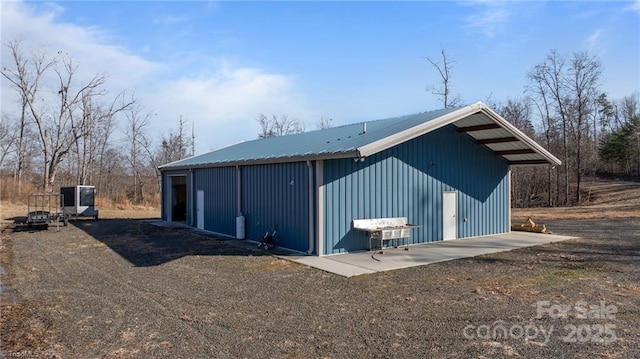 view of outbuilding featuring a garage