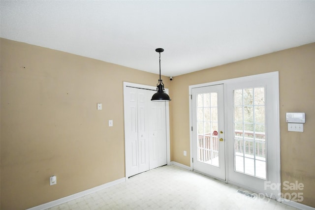 spare room with french doors