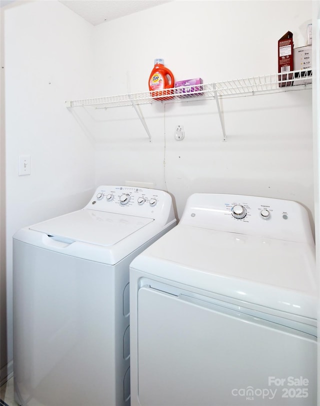 laundry area featuring independent washer and dryer