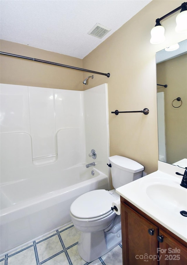 full bathroom with vanity, tile patterned floors, bathing tub / shower combination, and toilet