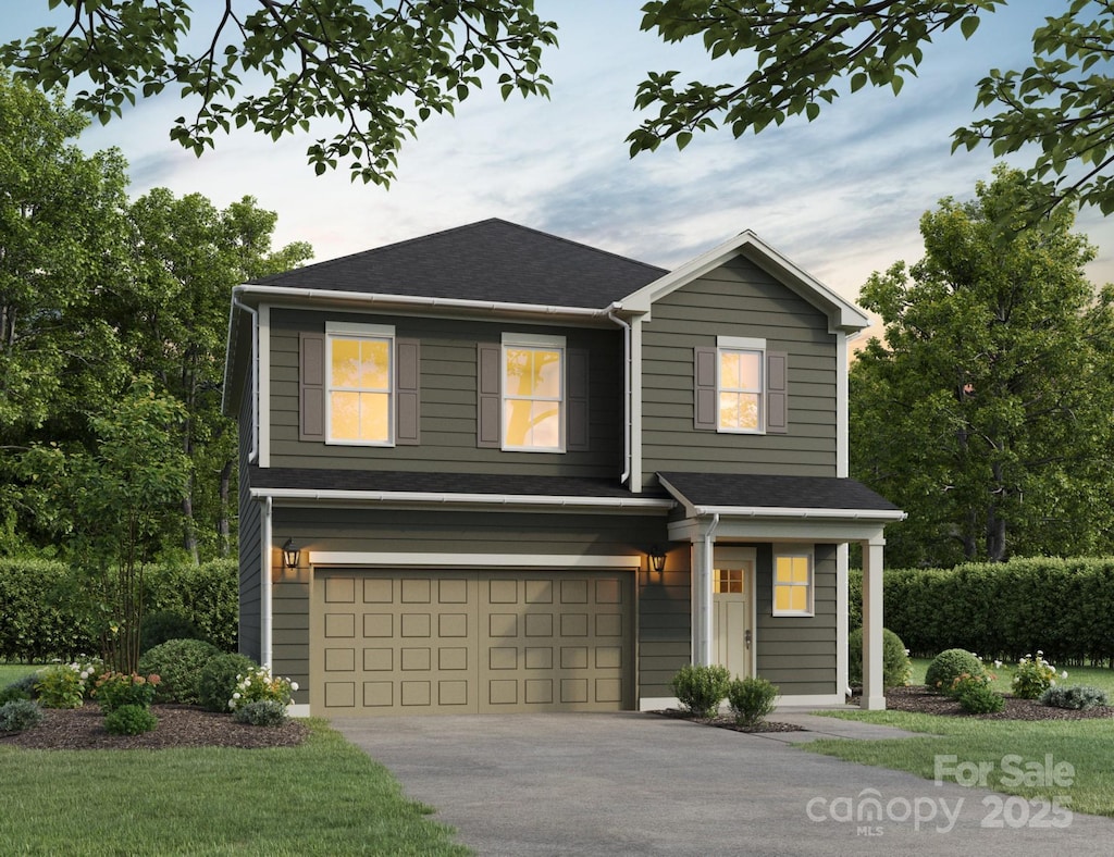 view of front of home with a garage