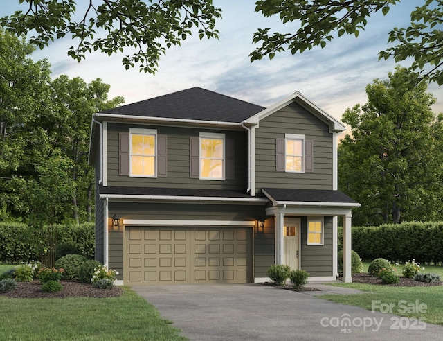 view of front of home featuring a garage, concrete driveway, and roof with shingles