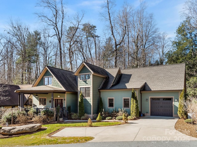 view of front of home with a porch and a garage