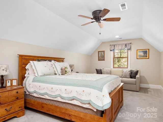 carpeted bedroom with lofted ceiling and ceiling fan