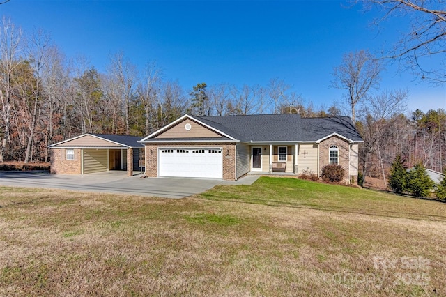 ranch-style home featuring a garage, covered porch, and a front lawn