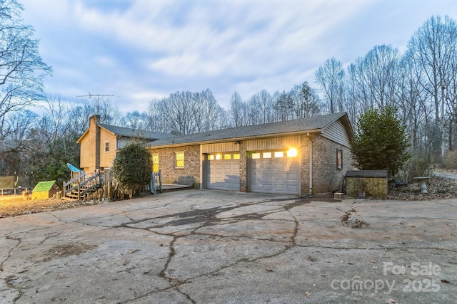 exterior space with a garage