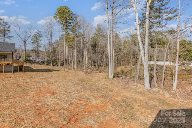 view of yard featuring a deck