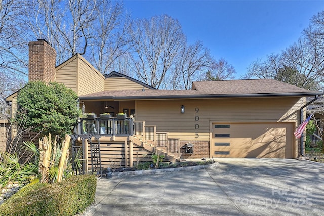 view of front of house featuring a garage and a porch