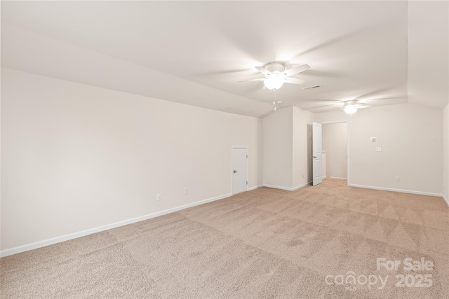 unfurnished room featuring visible vents, a ceiling fan, baseboards, and light colored carpet