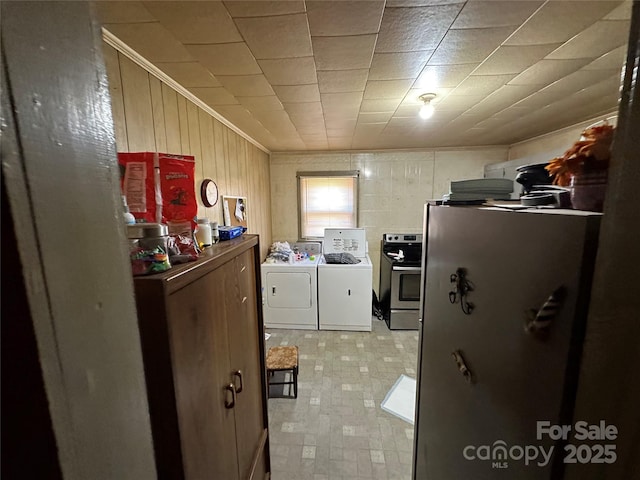 washroom featuring separate washer and dryer