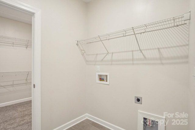 clothes washing area with carpet flooring, washer hookup, and hookup for an electric dryer