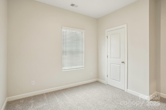 view of carpeted spare room