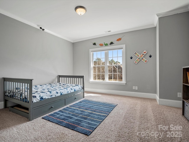 carpeted bedroom with baseboards, visible vents, and ornamental molding