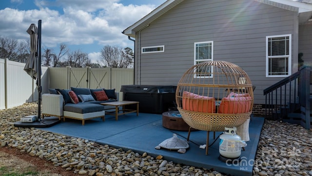 view of patio / terrace featuring a hot tub