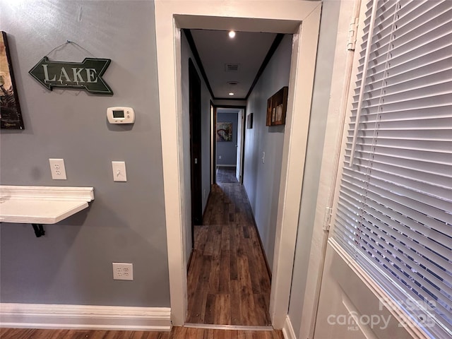 hall featuring dark hardwood / wood-style floors