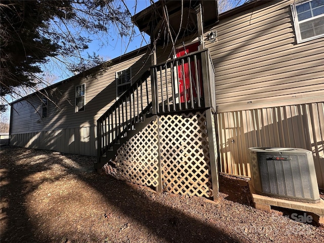 view of home's exterior featuring cooling unit